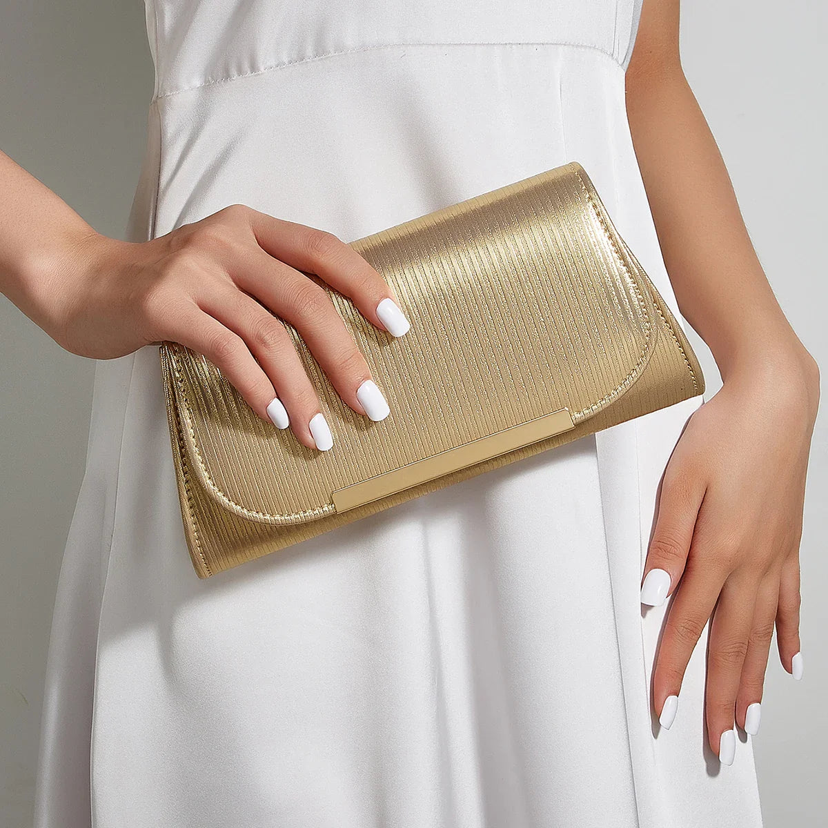 Noma Clutch Bag
